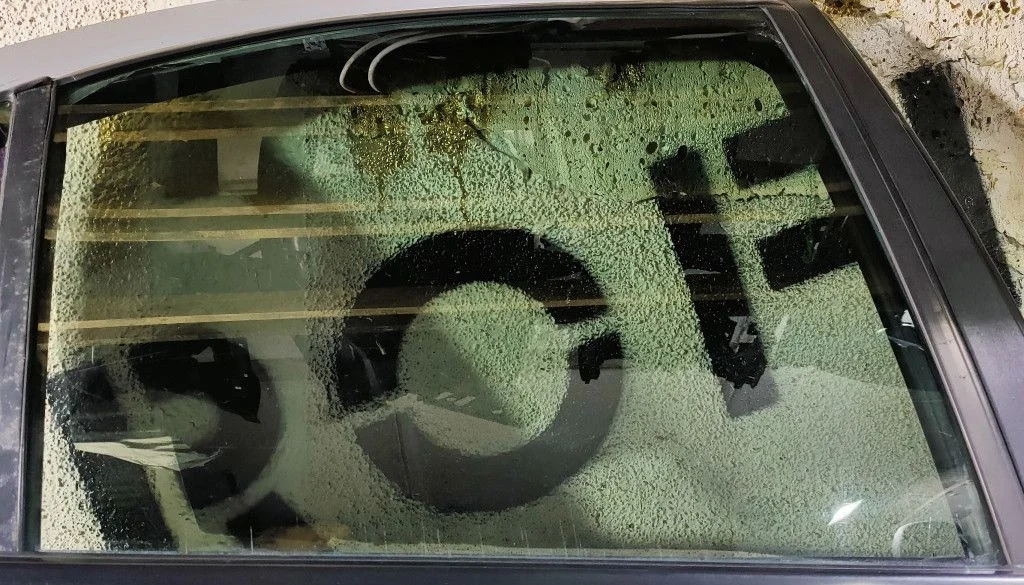 Стекло двери задней правой Nissan Almera (N16) II