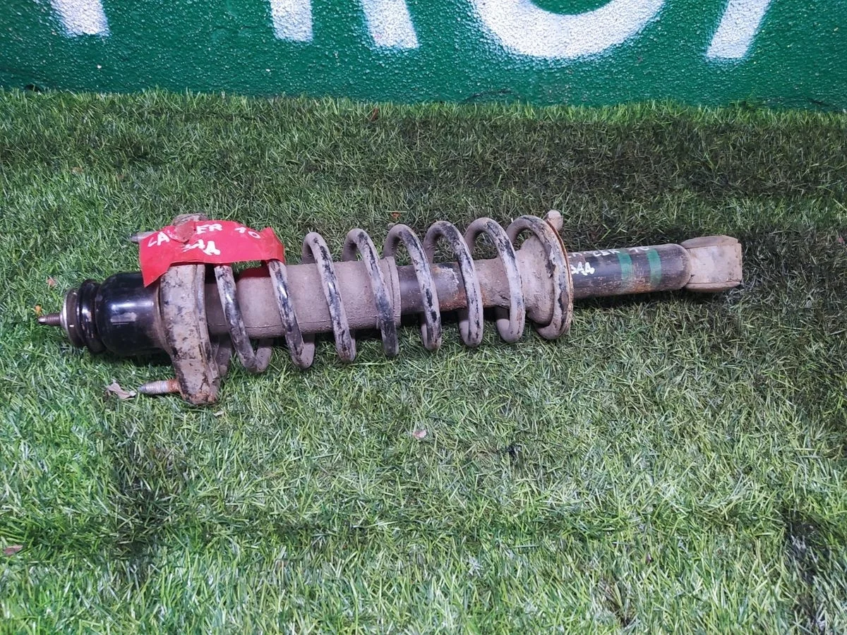 Mitsubishi Lancer 10 Амортизатор задний