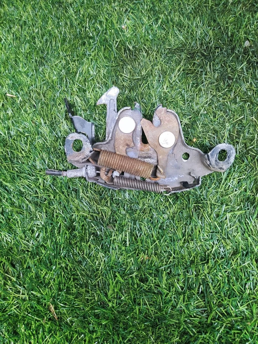 Замок капота Nissan Almera Classic