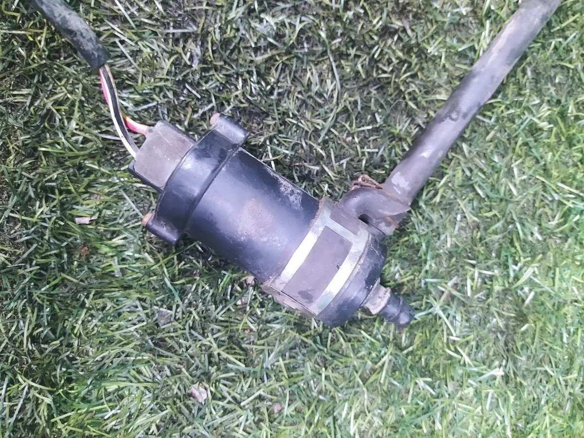 Насос фароомывателя Nissan X-trail