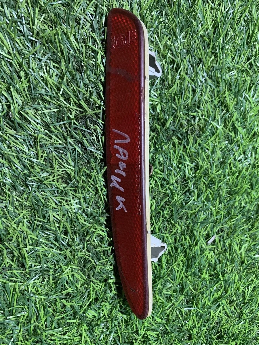 Отражатель в бампер задний Chevrolet Lacetti