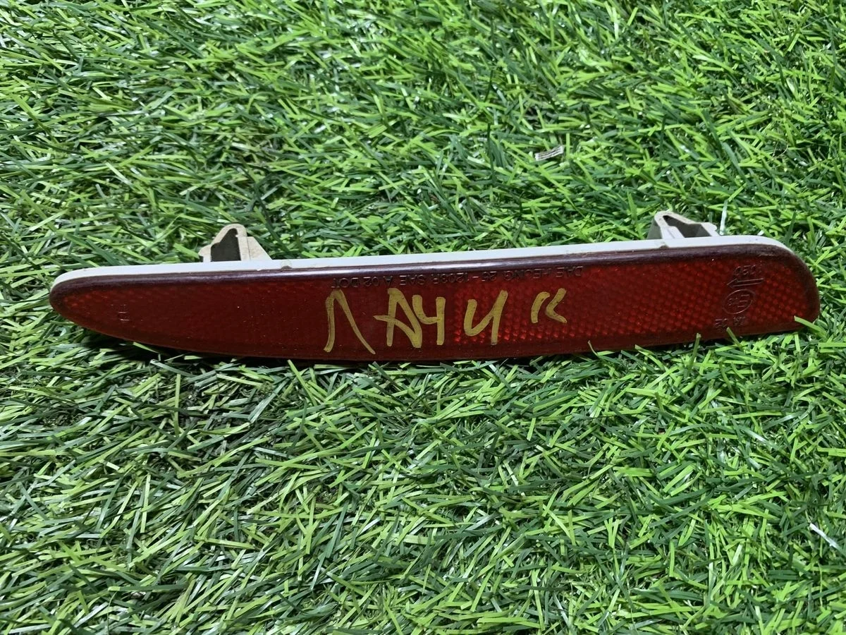 Отражатель в бампер задний Chevrolet Lacetti