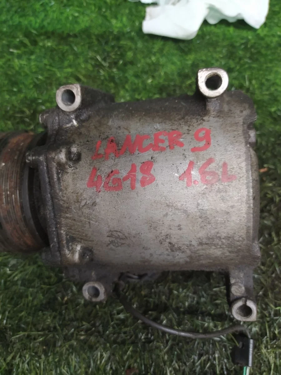 Компрессор кондиционера Mitsubishi Lancer 9