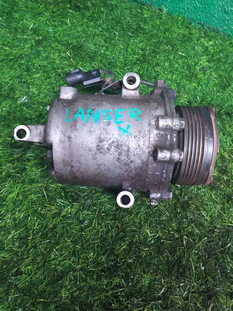 Компрессор кондиционера Mitsubishi Lancer 10