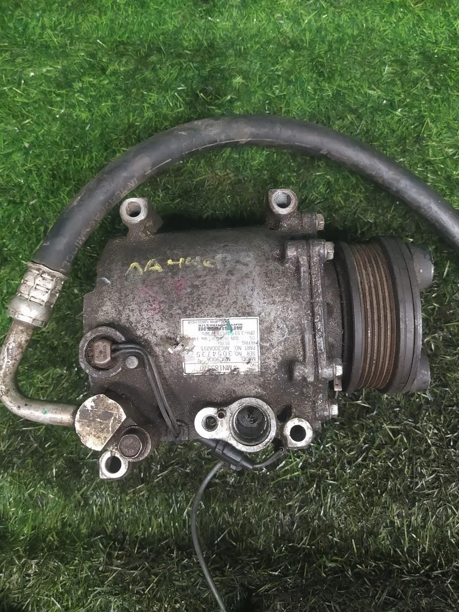 Компрессор кондиционера Mitsubishi Lancer 9