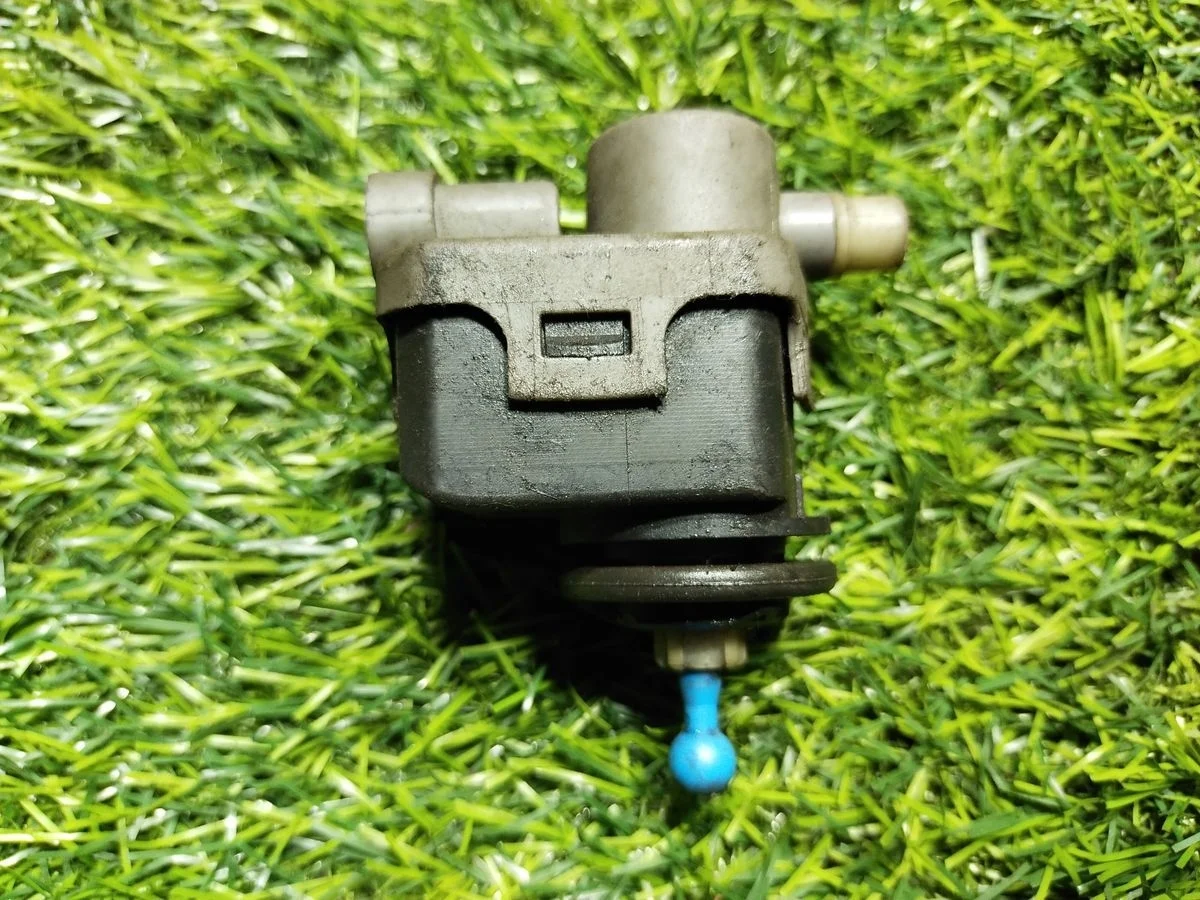 Моторчик корректора фары Renault Logan