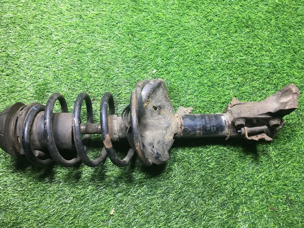 Амортизатор передний левый Chevrolet Lacetti