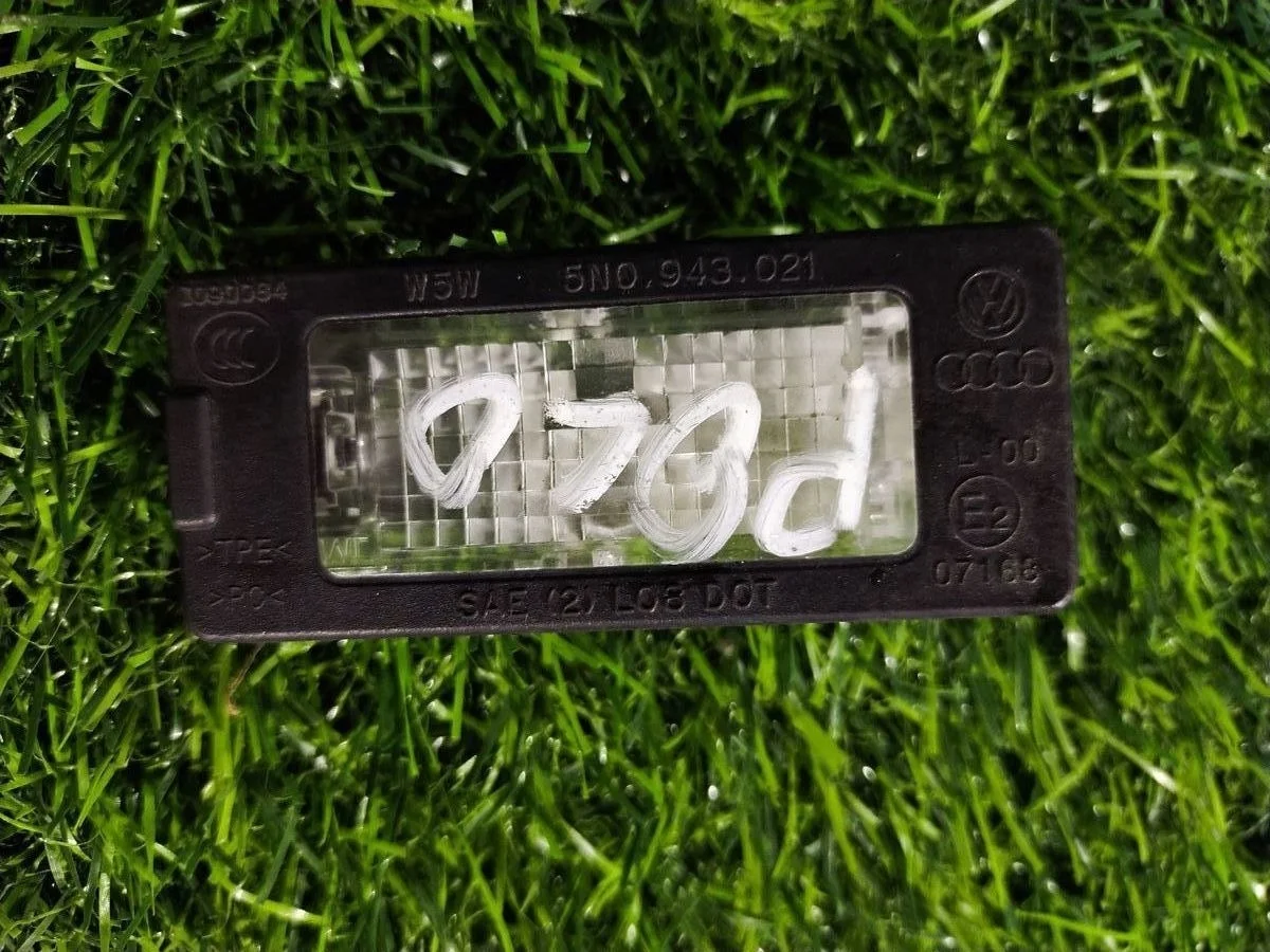 Фонарь подсветки номера Volkswagen Polo V (2009—2015)