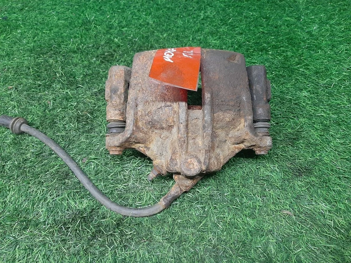 Суппорт передний левый на Ford Mondeo 3