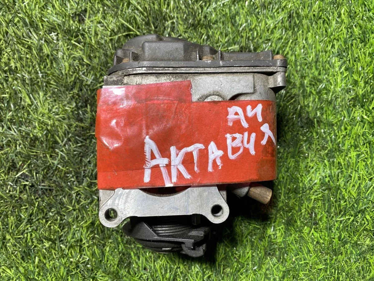 Заслонка дроссельная Skoda Octavia A4