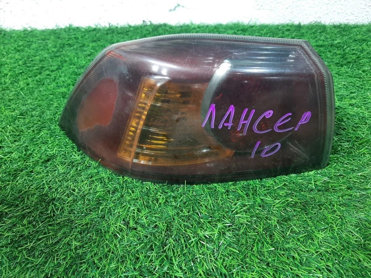 Фонарь левый на Mitsubishi Lancer X