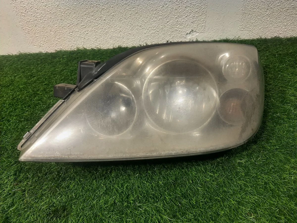 Фара левая на Nissan Primera 3 P12