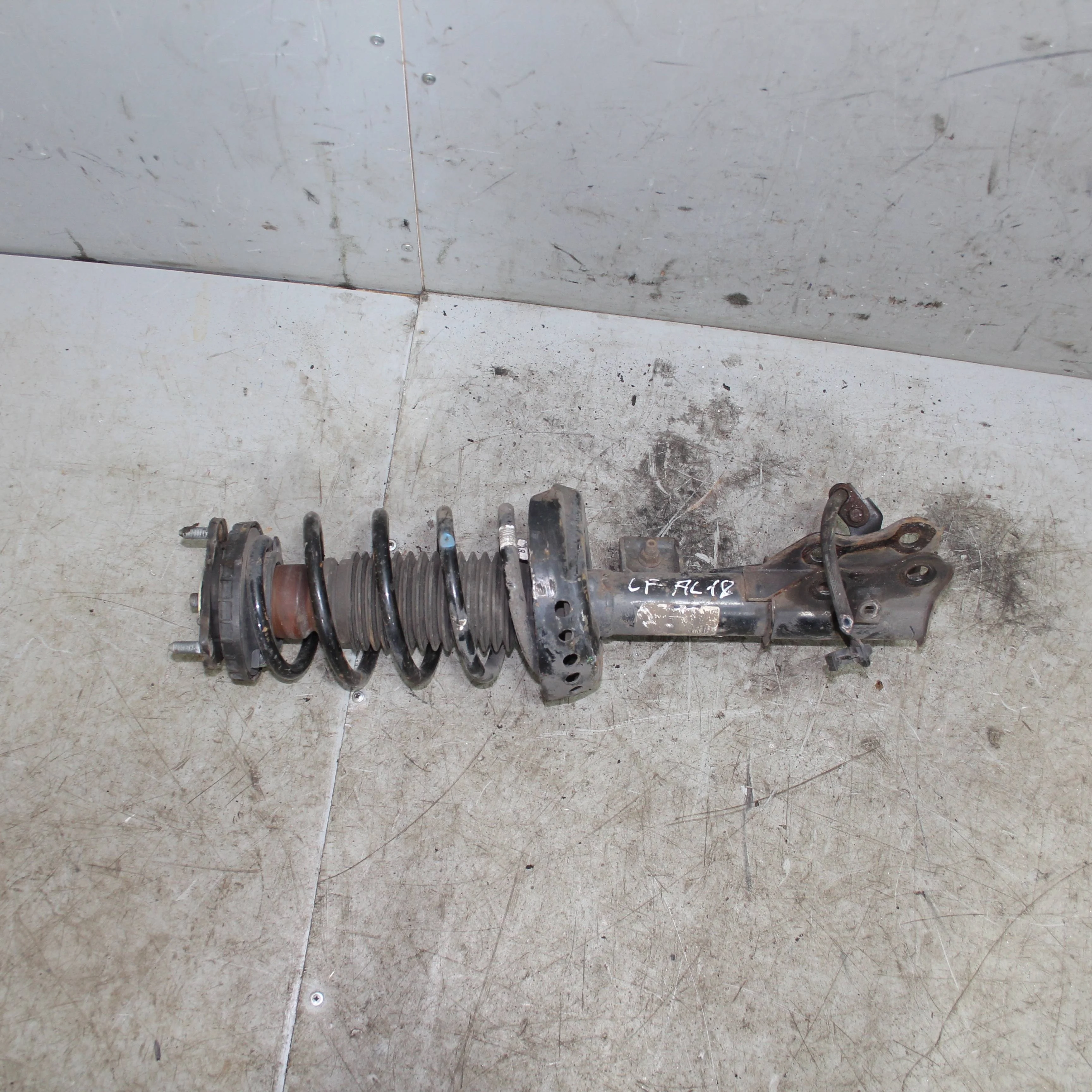 Амортизатор передний левый HONDA Civic IX (2011—2