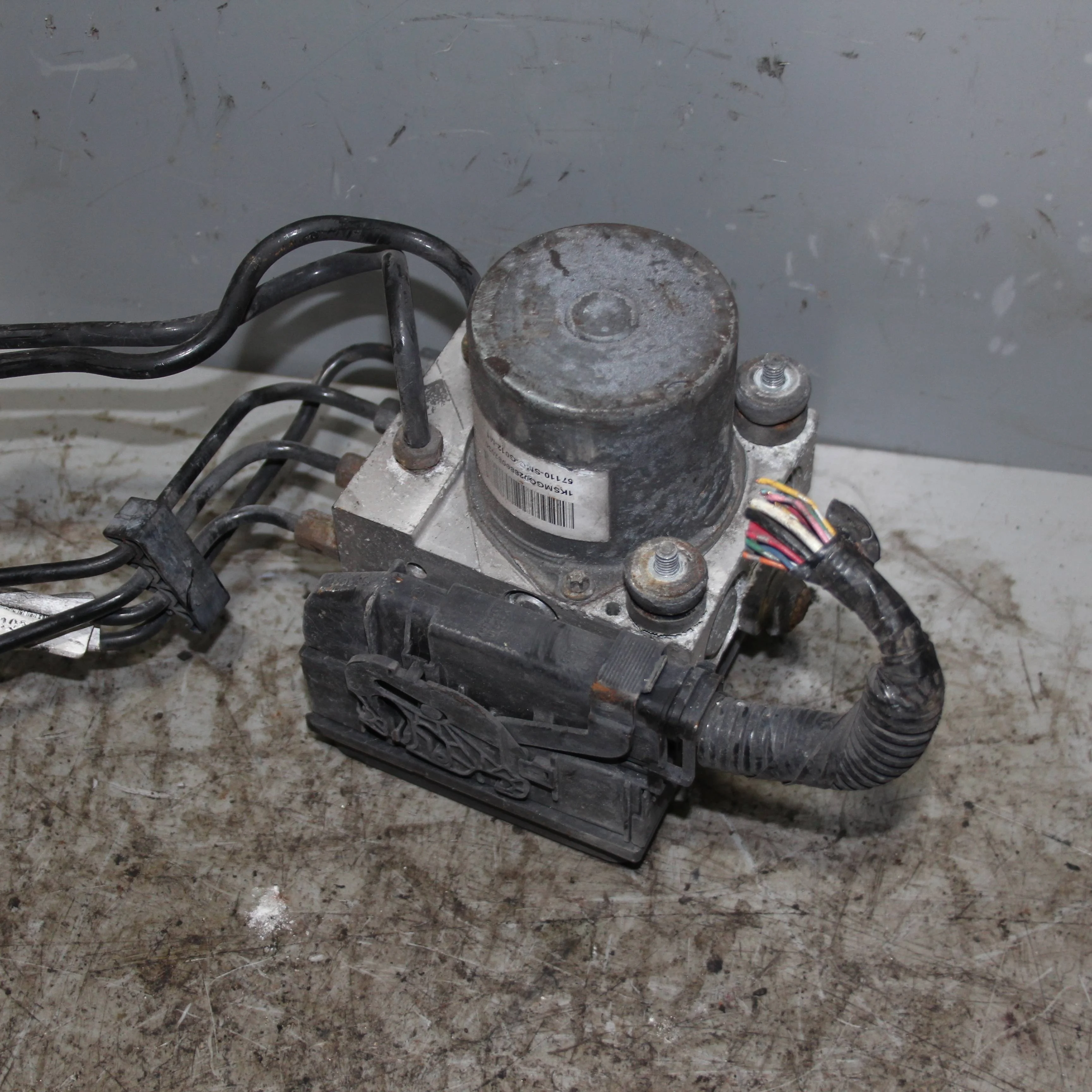 Блок ABS (насос) HONDA Civic VIII (2005—2009)