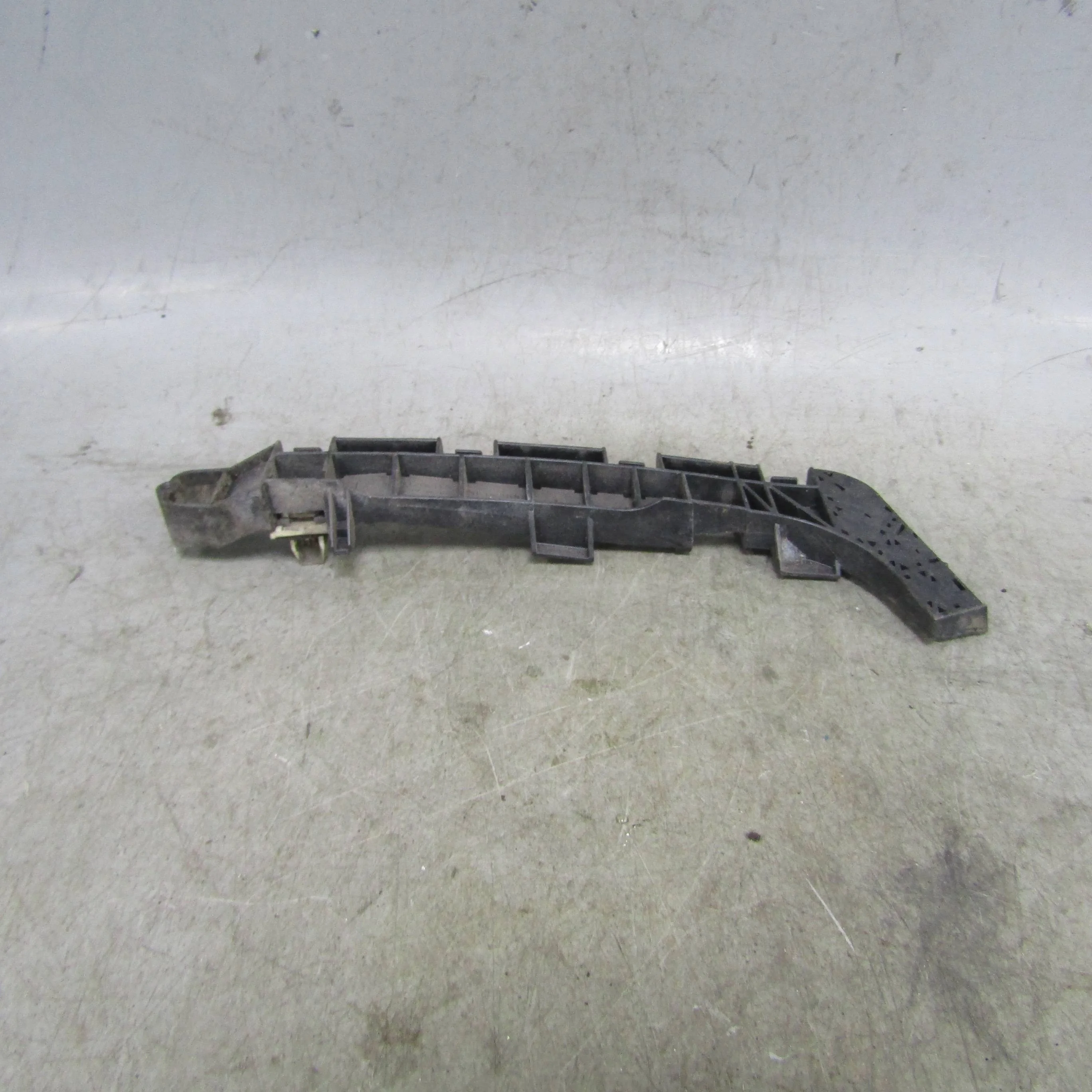 Кронштейн заднего бампера левый HONDA Civic VIII