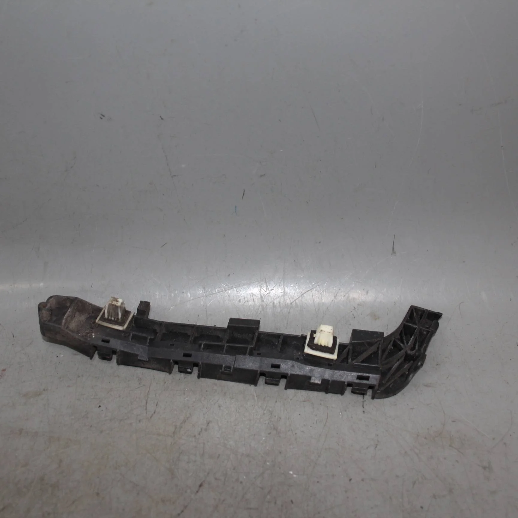 Кронштейн заднего бампера левый HONDA Civic VIII