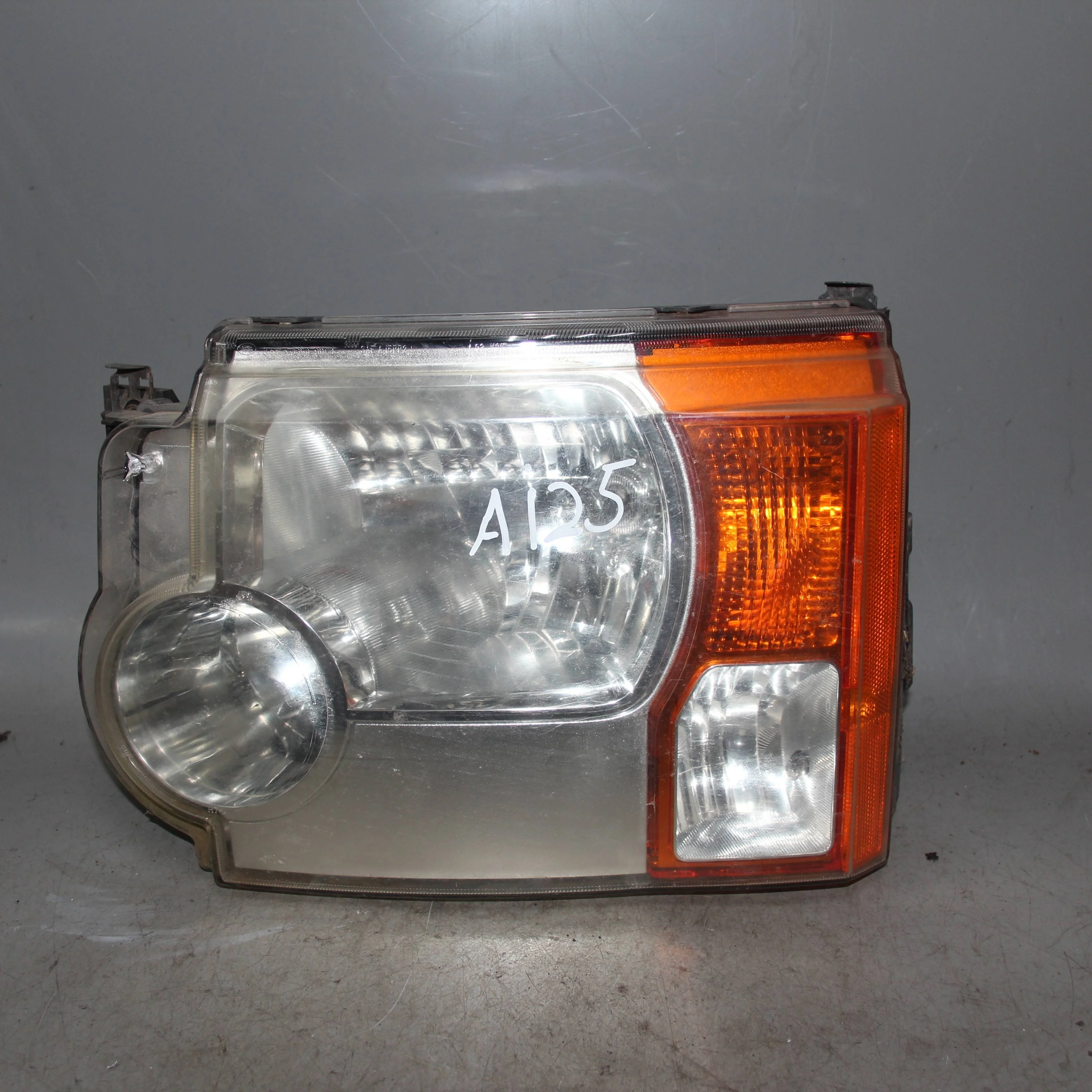 Фара левая LAND ROVER Discovery III (2004—2009)