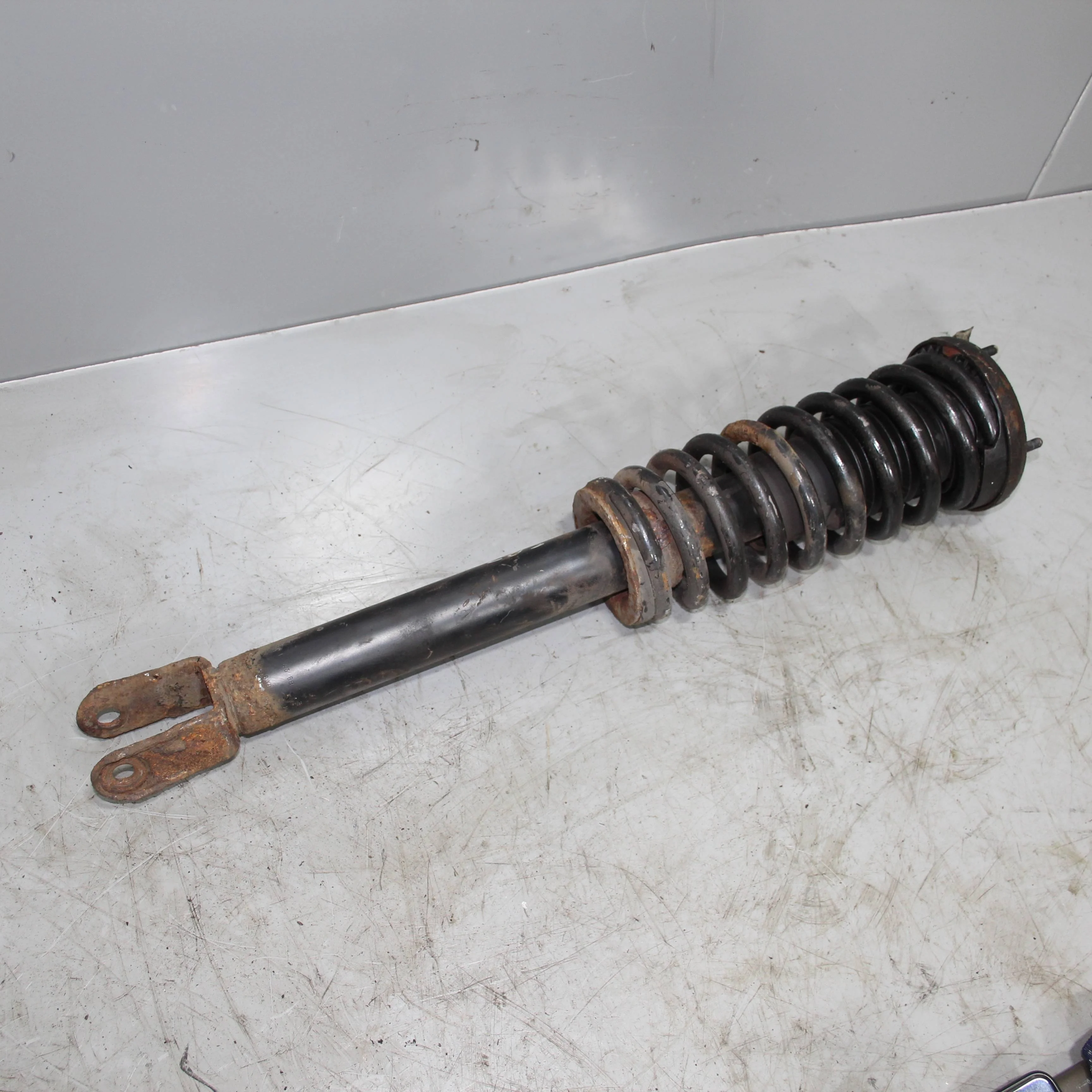 Амортизатор передний JAGUAR XF I рестайлинг (2011