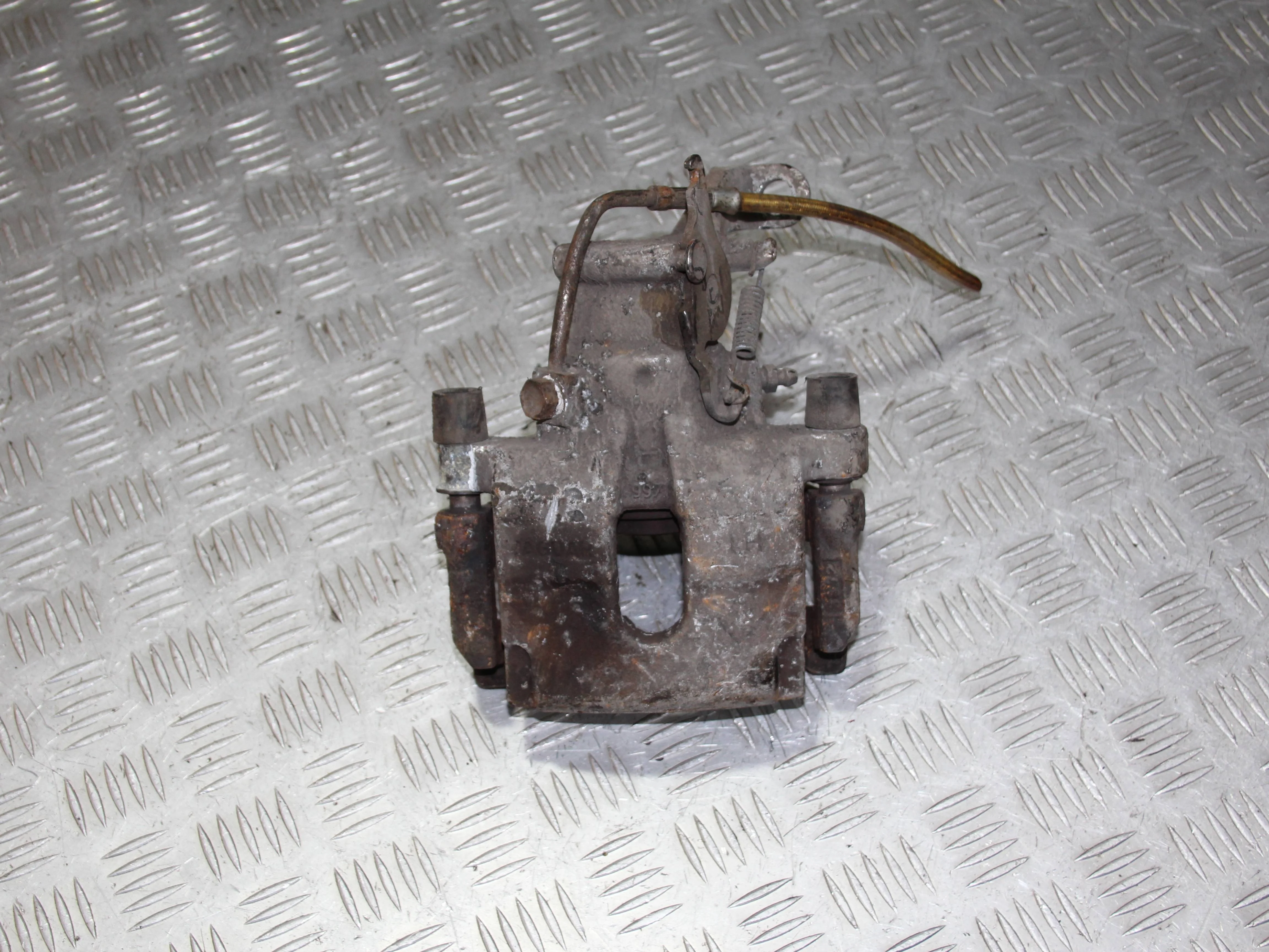 Суппорт задний левый JAGUAR XF I рестайлинг (2011