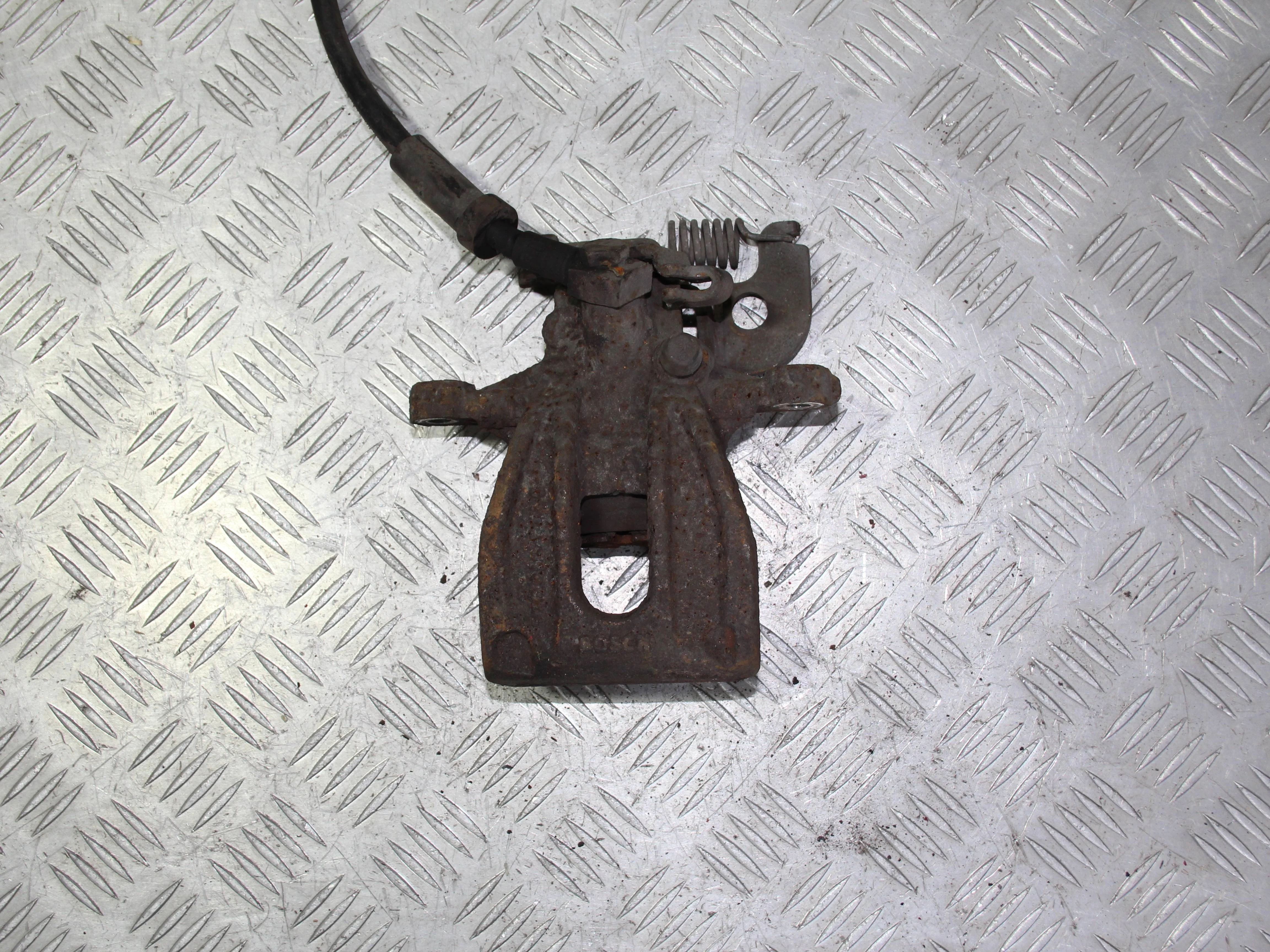 Суппорт задний левый JAGUAR X-type I (2001—2009)