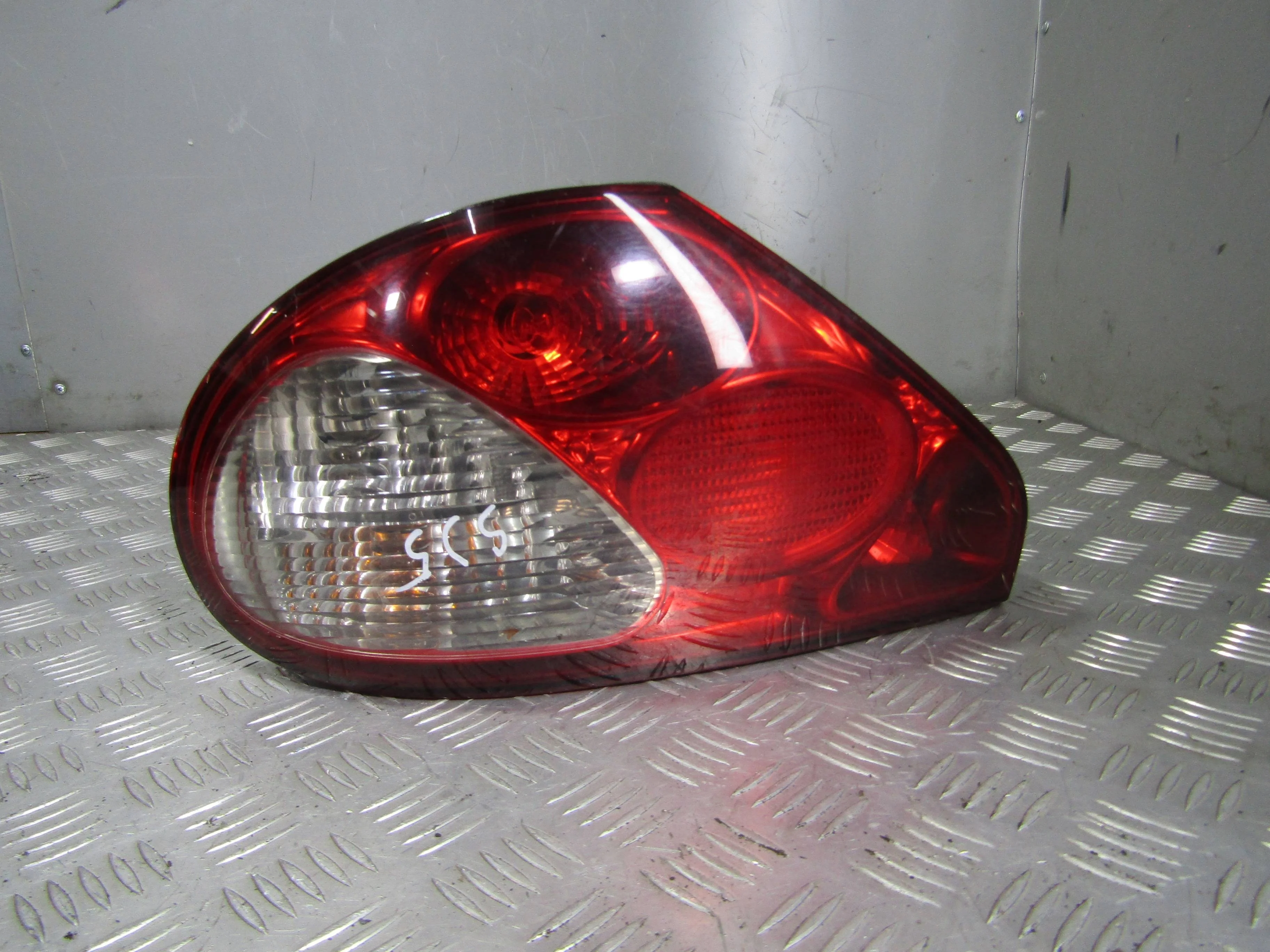 Фонарь внешний левый JAGUAR X-type I (2001—2009)