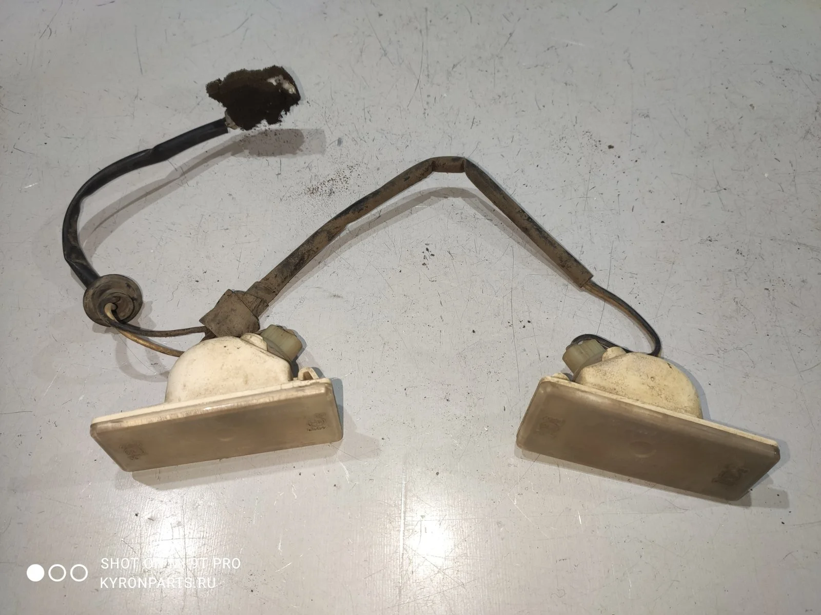 Фонарь подсветки номерного знака Ssangyong Kyron