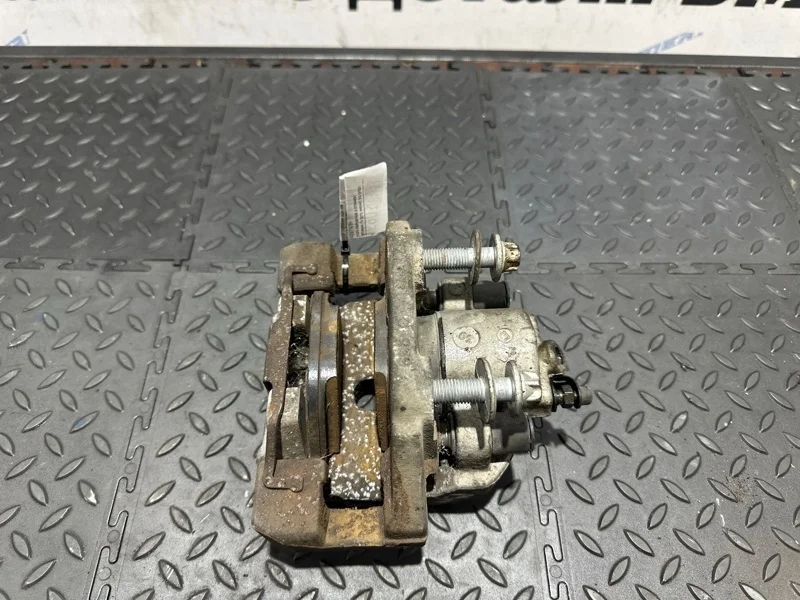 Суппорт тормозной BMW Х5 34216776789 F15 N63B44B, задний левый