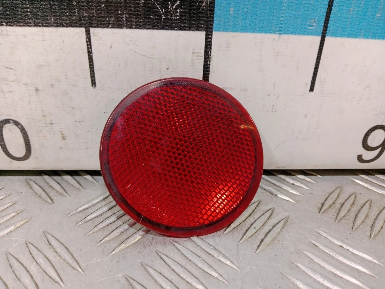 [Б/У] Отражатель в бампер задний левый [Код: 00575319 ]