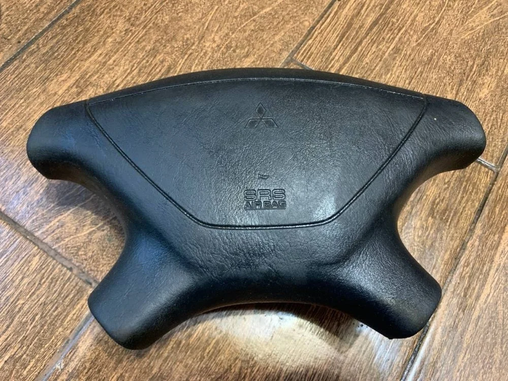 Подушка безопасности в рулевое колесо Mitsubishi Galant VIII (1996—1999)