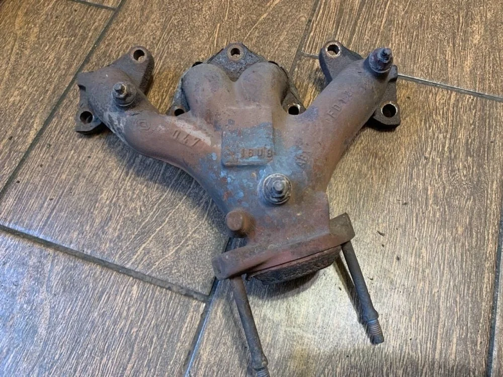 Коллектор выпускной Renault Logan I (2004—2009)