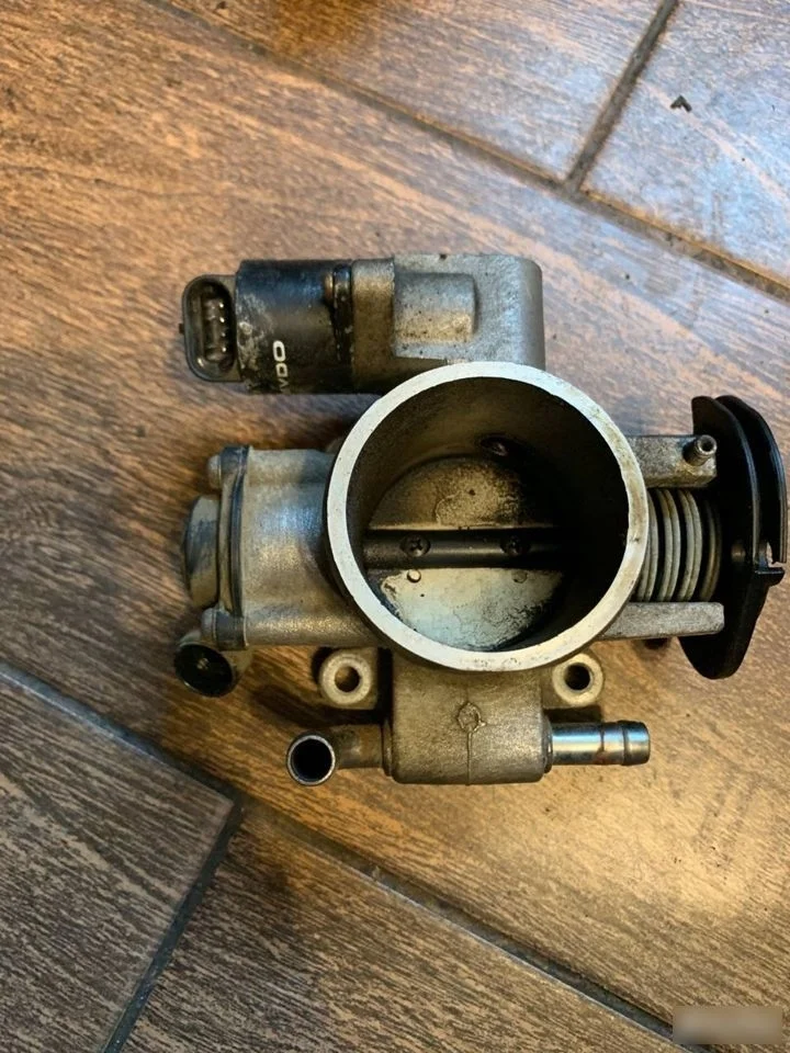 Заслонка воздушная Chevrolet Aveo I (2003—2008)