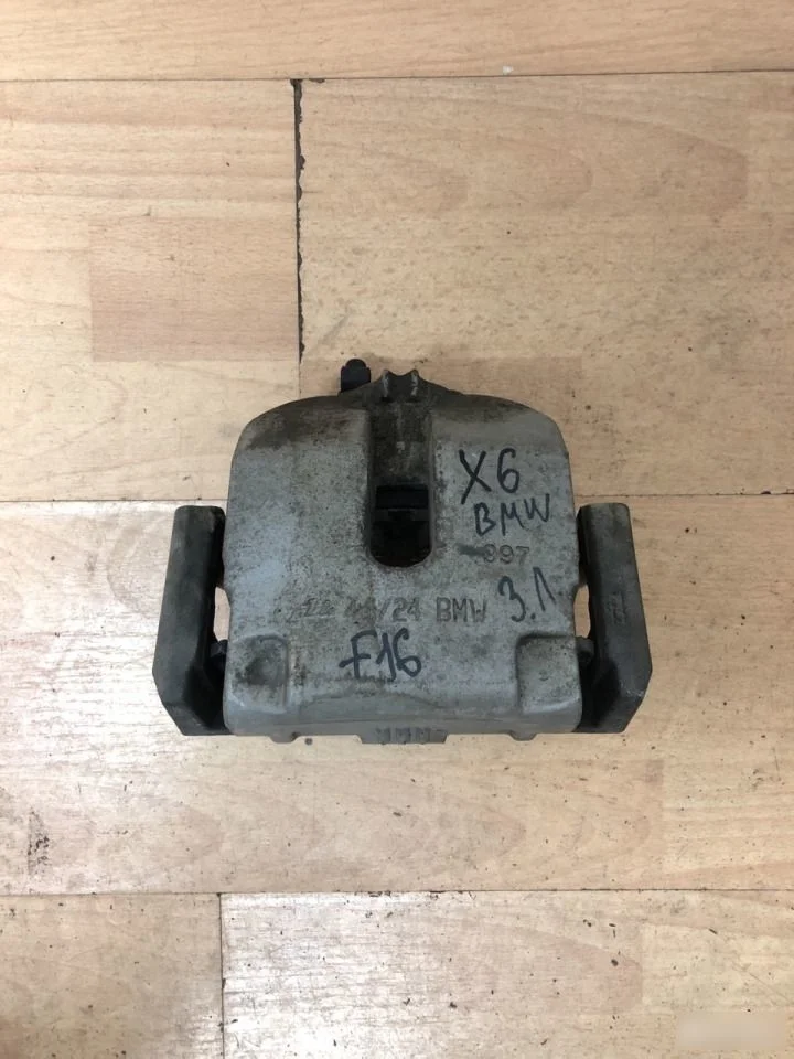 Суппорт тормозной задний левый BMW X6 F16 (2014—2020)
