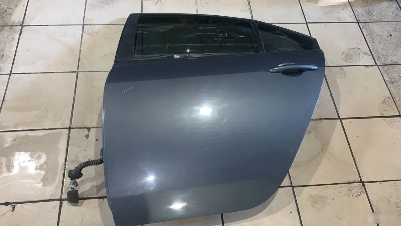 Дверь задняя левая Nissan Primera P12 (2001—2008)
