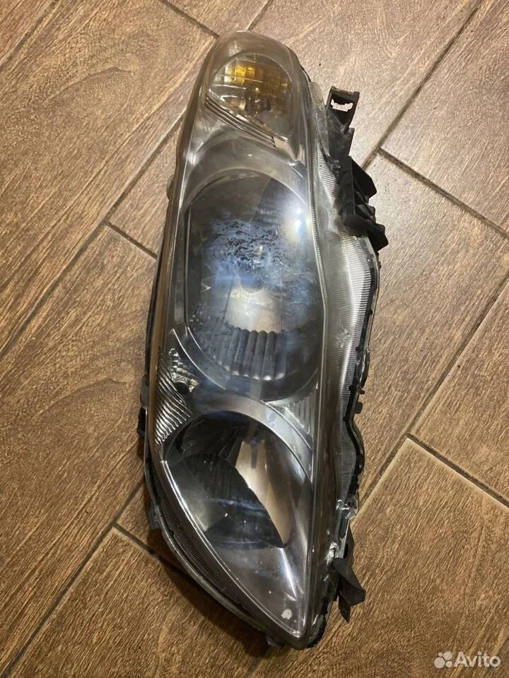 Фара левая Toyota Corolla X (2006—2010)