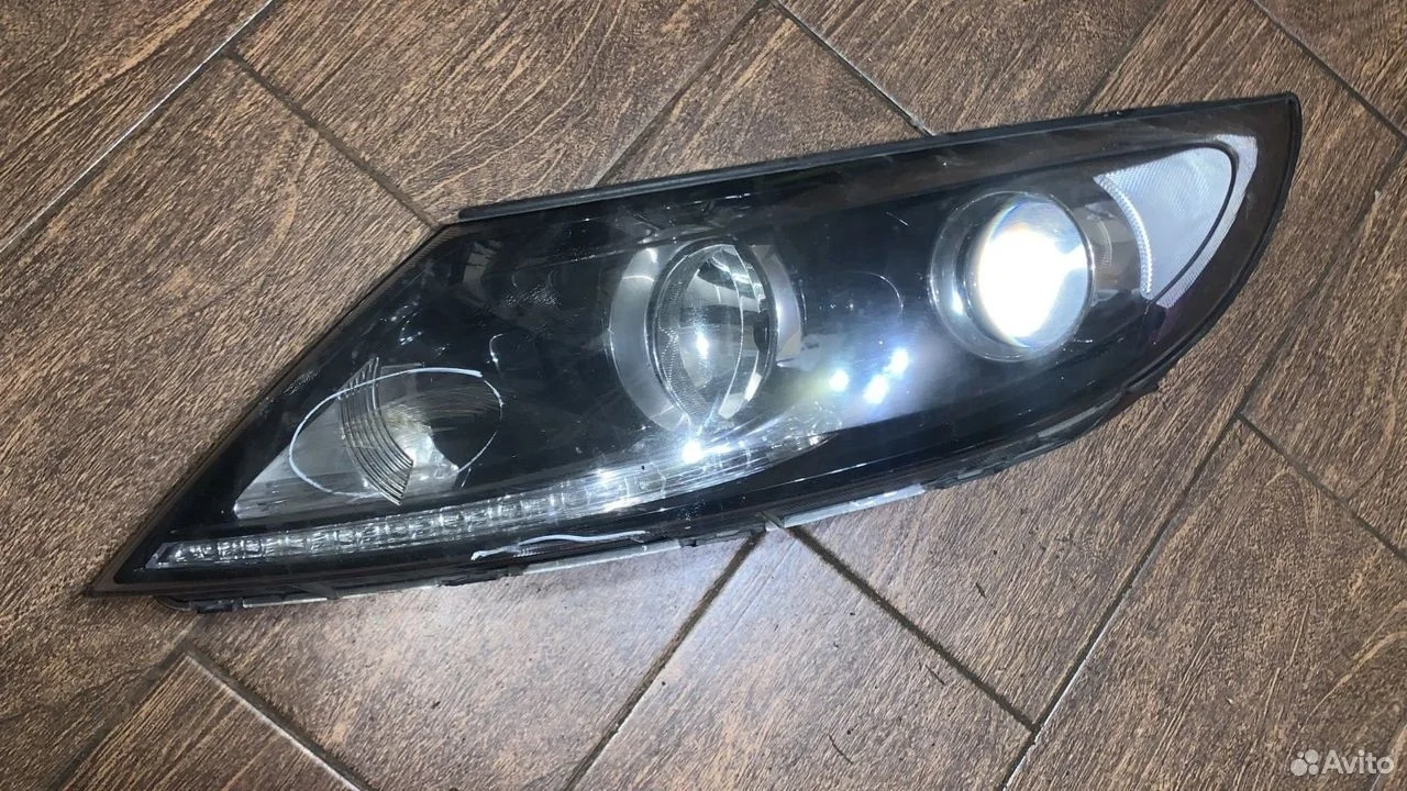 Фара левая Kia Sportage III (2010—2014)