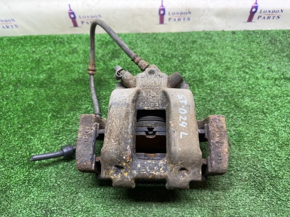 Суппорт тормозной BMW 320D F30