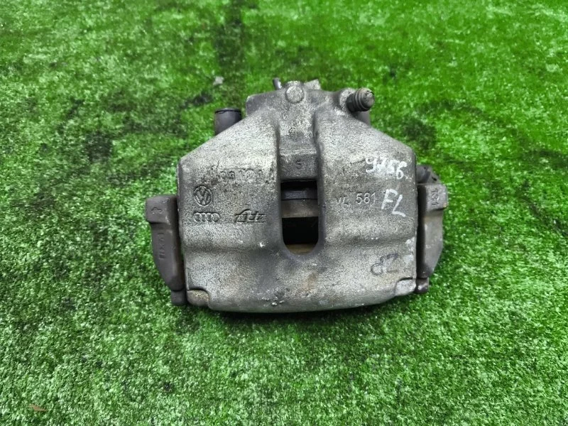 Суппорт передний левый Volkswagen Passat 2011 1K0615123E B7 CAXA