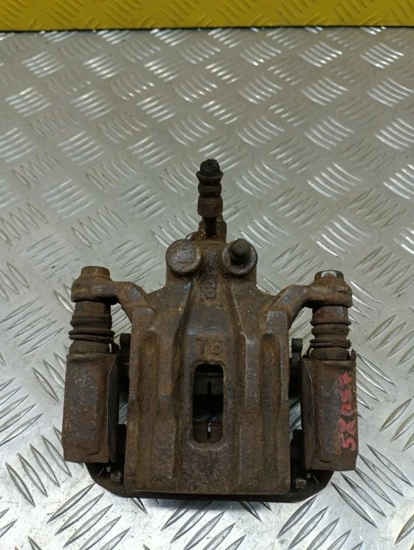 Суппорт задний левый Nissan Pathfinder (R51M) 2004-2013 2010 44011EB30A 2.5 D YD25DDTI