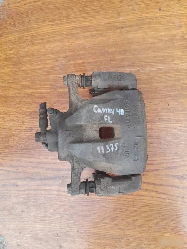 Суппорт Toyota Camry 2010 4775033340 ACV40, передний левый