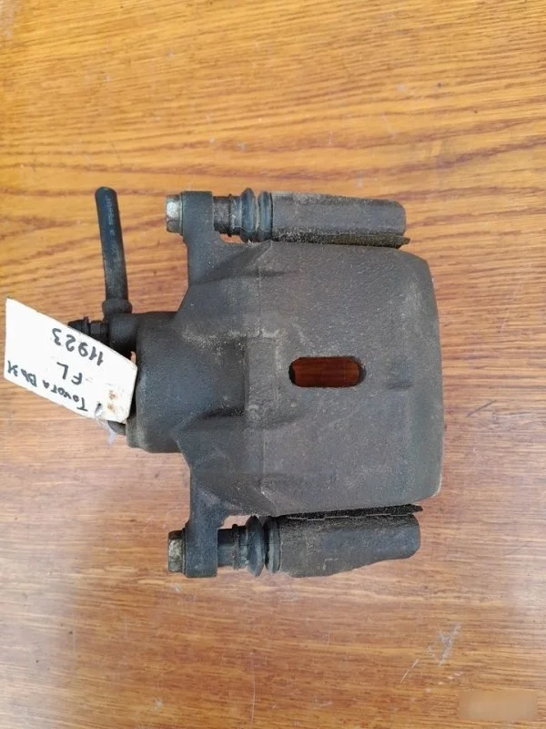 Суппорт Toyota bB 2003 4775052020 NCP34, передний левый