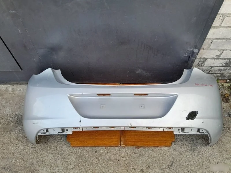 Бампер Opel Astra J 2010 13266587 P10, задний