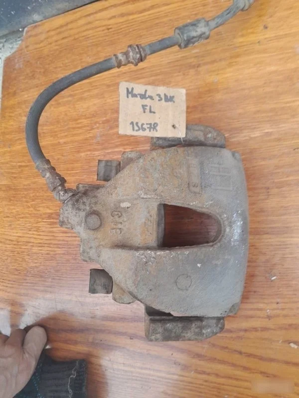 Суппорт Mazda Mazda3 2009 BPYK3371XA BK Z6, передний левый