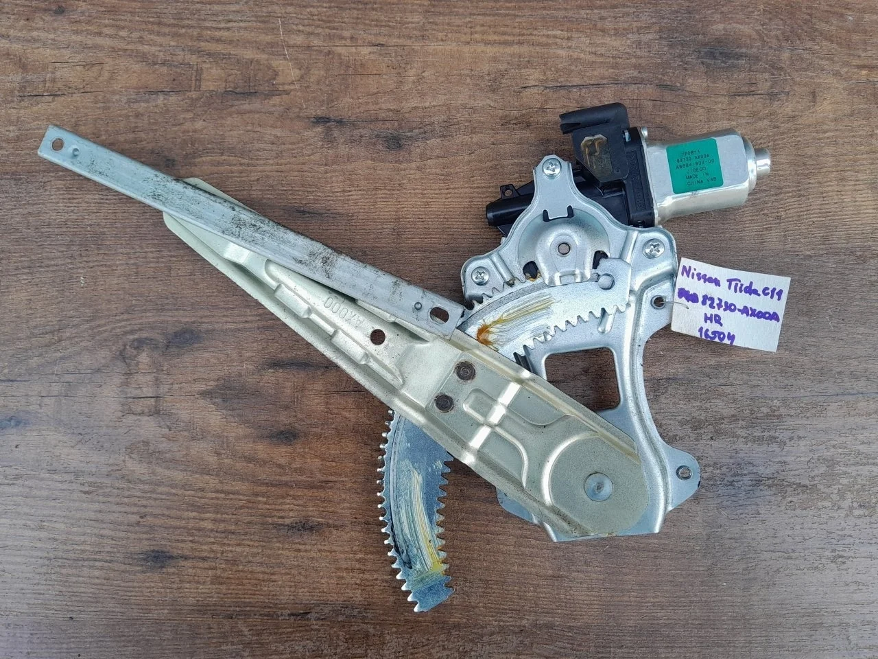 Стеклоподъемник Nissan Tiida 2007-2014 82730AX00A C11, задний правый