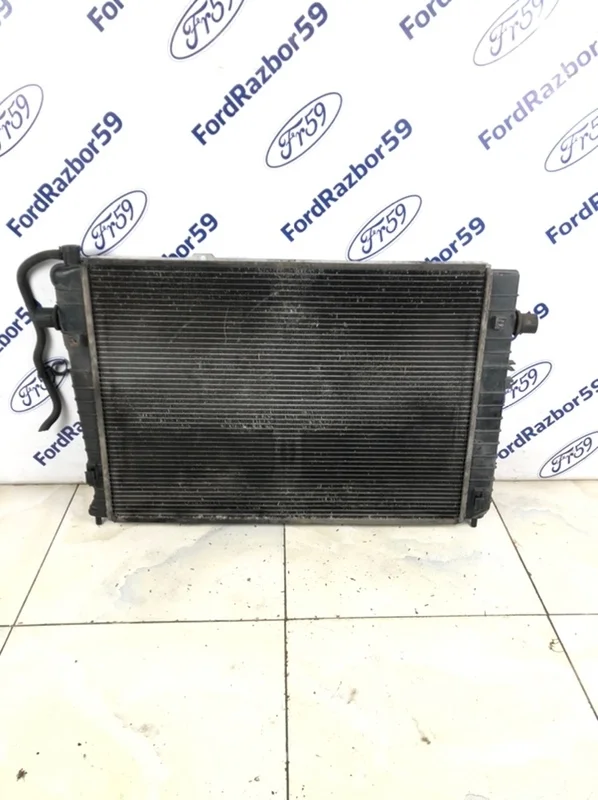 Радиатор ДВС Kia Sportage 2006-2007 253102E500 KM