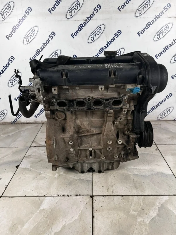 Двигатель Ford Focus 2 2006 1806552 CB4 1.6 (HWDA)