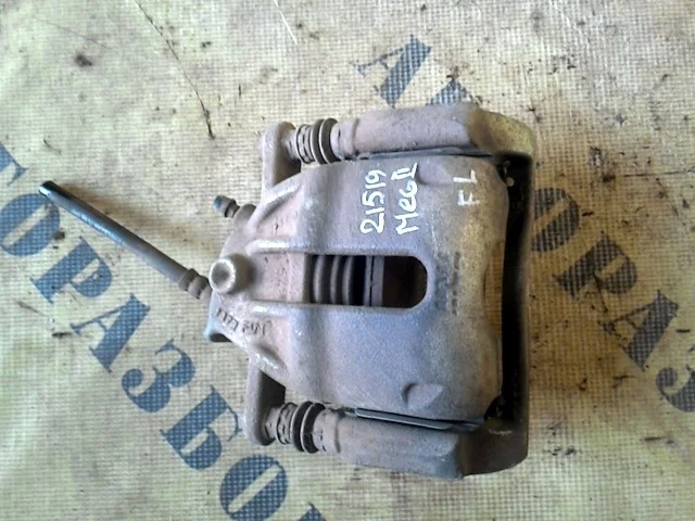 Суппорт передний левый NISSAN ALMERA (G15) 2013-2018 4101100Q0F