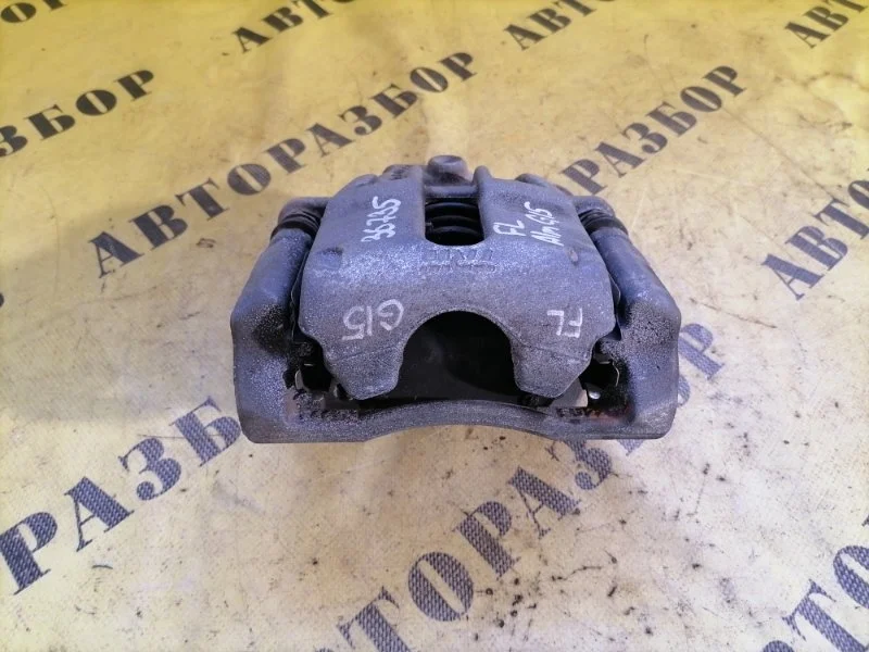 Суппорт передний левый NISSAN ALMERA (G15) 2013-2018 2016 4101100Q0F СЕДАН 1.6 K4M 102Л/С