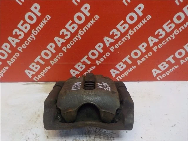 Суппорт Nissan Note 2006-2013 41001AX60A E11, передний правый