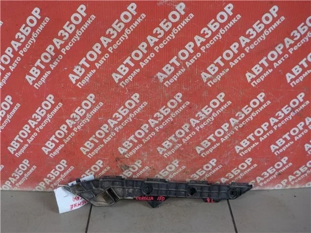 Кронштейн бампера Toyota Corolla 2012 5215612290 ADE150 1ZR, задний левый