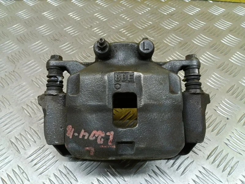 Суппорт передний левый Mitsubishi L200 (2006-2015) 2007 4605A201 ПИКАП 2.5 D 4D56